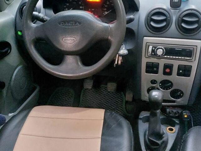 Зеленый Дачия Логан, объемом двигателя 1.4 л и пробегом 305 тыс. км за 2800 $, фото 11 на Automoto.ua
