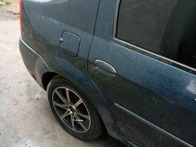 Зеленый Дачия Логан, объемом двигателя 1.4 л и пробегом 305 тыс. км за 2800 $, фото 4 на Automoto.ua