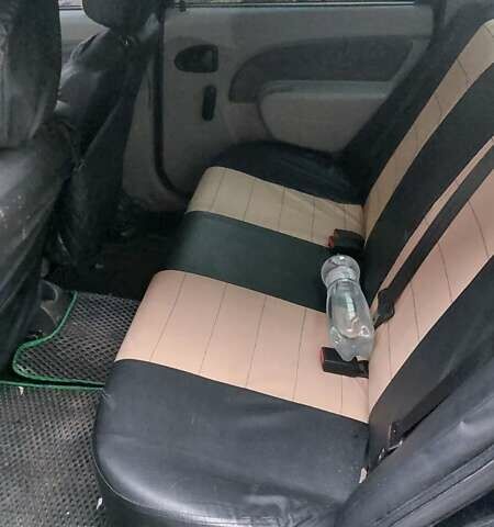 Зелений Дачія Logan, об'ємом двигуна 1.39 л та пробігом 305 тис. км за 3000 $, фото 1 на Automoto.ua