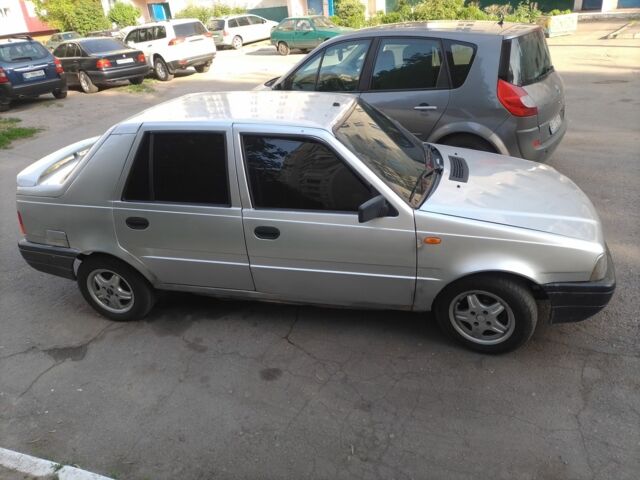 Серый Дачия Нова, объемом двигателя 1.4 л и пробегом 208 тыс. км за 850 $, фото 1 на Automoto.ua