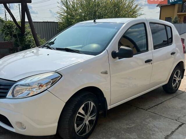 Білий Дачія Sandero, об'ємом двигуна 1.4 л та пробігом 335 тис. км за 3500 $, фото 6 на Automoto.ua