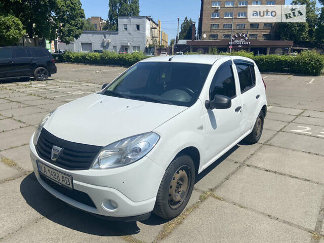 Білий Дачія Sandero, об'ємом двигуна 1.4 л та пробігом 297 тис. км за 3200 $, фото 9 на Automoto.ua