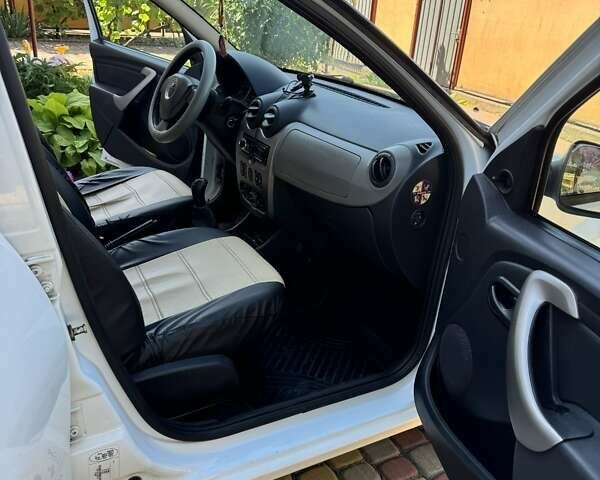 Білий Дачія Sandero, об'ємом двигуна 1.15 л та пробігом 194 тис. км за 3700 $, фото 7 на Automoto.ua
