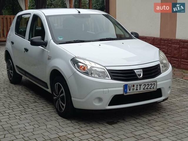 Білий Дачія Sandero, об'ємом двигуна 1.2 л та пробігом 160 тис. км за 4299 $, фото 26 на Automoto.ua