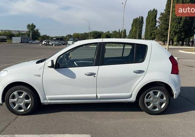 Білий Дачія Sandero, об'ємом двигуна 1.4 л та пробігом 140 тис. км за 4200 $, фото 10 на Automoto.ua