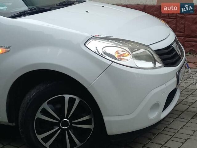 Білий Дачія Sandero, об'ємом двигуна 1.2 л та пробігом 160 тис. км за 4299 $, фото 18 на Automoto.ua
