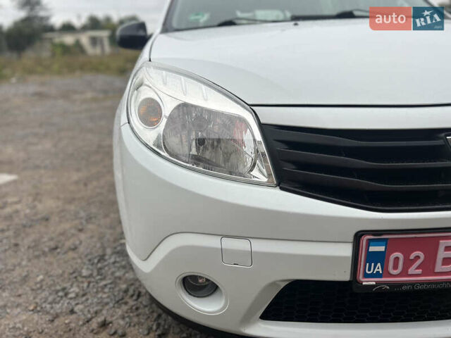 Білий Дачія Sandero, об'ємом двигуна 1.2 л та пробігом 142 тис. км за 4650 $, фото 25 на Automoto.ua