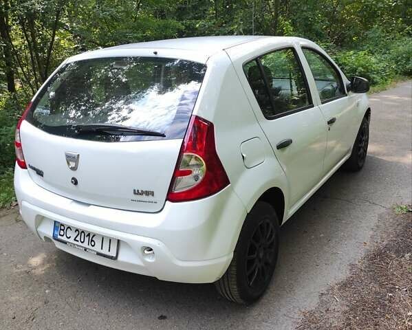 Білий Дачія Sandero, об'ємом двигуна 1.4 л та пробігом 225 тис. км за 2900 $, фото 9 на Automoto.ua