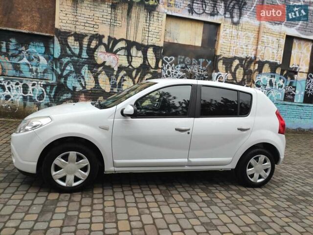 Белый Дачия Сандеро, объемом двигателя 1.4 л и пробегом 166 тыс. км за 4550 $, фото 2 на Automoto.ua