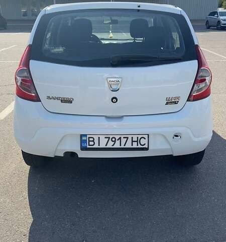 Білий Дачія Sandero, об'ємом двигуна 1.4 л та пробігом 140 тис. км за 4200 $, фото 1 на Automoto.ua