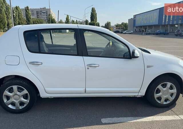 Білий Дачія Sandero, об'ємом двигуна 1.4 л та пробігом 140 тис. км за 4200 $, фото 8 на Automoto.ua