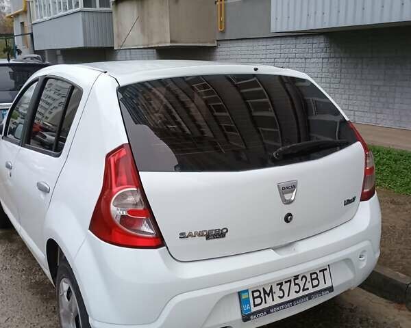 Белый Дачия Сандеро, объемом двигателя 1.15 л и пробегом 142 тыс. км за 4300 $, фото 2 на Automoto.ua