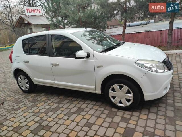 Белый Дачия Сандеро, объемом двигателя 1.4 л и пробегом 166 тыс. км за 4550 $, фото 8 на Automoto.ua