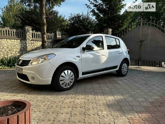 Білий Дачія Sandero, об'ємом двигуна 1.4 л та пробігом 180 тис. км за 3850 $, фото 6 на Automoto.ua