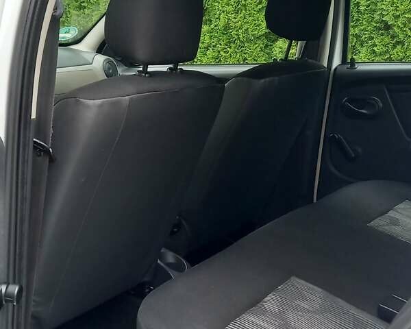 Білий Дачія Sandero, об'ємом двигуна 1.2 л та пробігом 160 тис. км за 4299 $, фото 60 на Automoto.ua