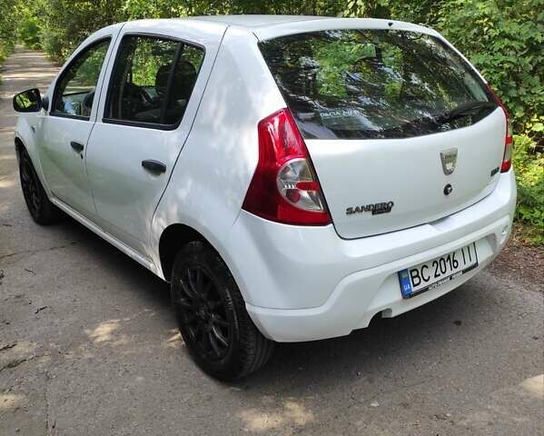 Білий Дачія Sandero, об'ємом двигуна 1.4 л та пробігом 225 тис. км за 2900 $, фото 6 на Automoto.ua