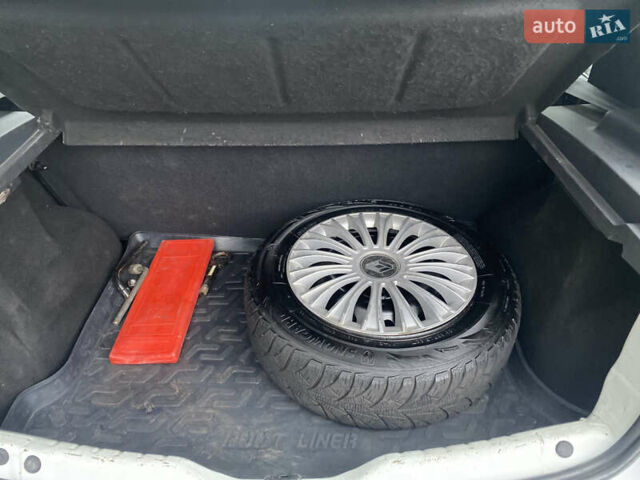 Білий Дачія Sandero, об'ємом двигуна 1.15 л та пробігом 186 тис. км за 3250 $, фото 19 на Automoto.ua