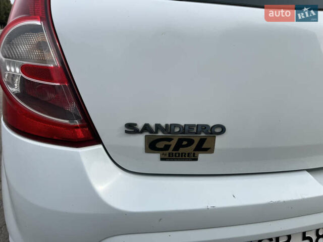 Білий Дачія Sandero, об'ємом двигуна 1.15 л та пробігом 230 тис. км за 3700 $, фото 16 на Automoto.ua