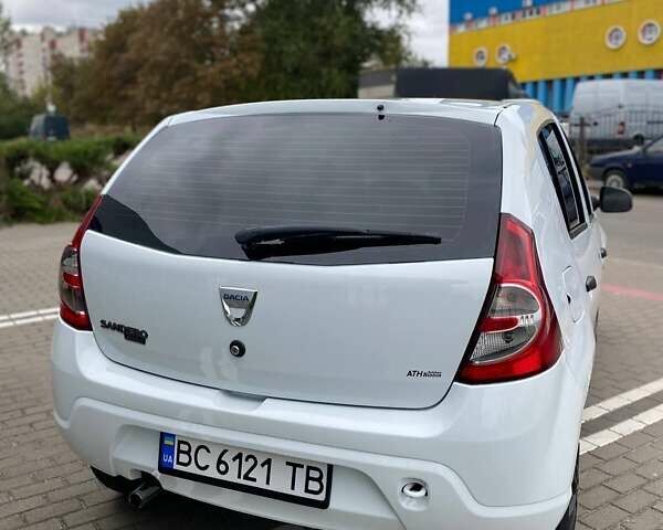 Білий Дачія Sandero, об'ємом двигуна 1.4 л та пробігом 255 тис. км за 4200 $, фото 9 на Automoto.ua