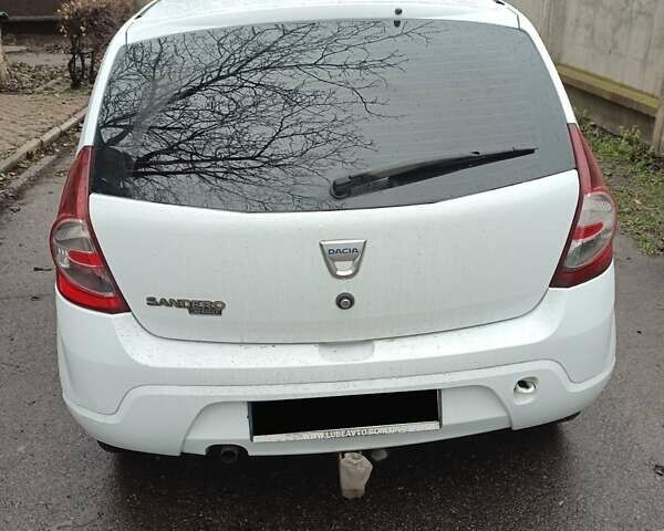 Білий Дачія Sandero, об'ємом двигуна 1.2 л та пробігом 168 тис. км за 4400 $, фото 5 на Automoto.ua