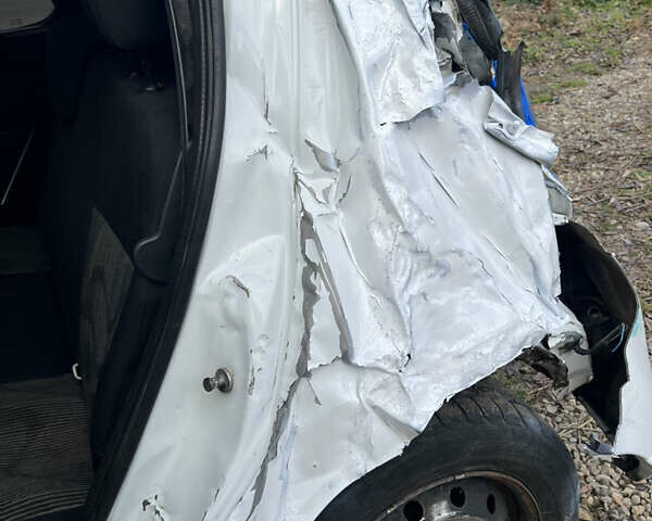 Білий Дачія Sandero, об'ємом двигуна 1.39 л та пробігом 450 тис. км за 1699 $, фото 10 на Automoto.ua