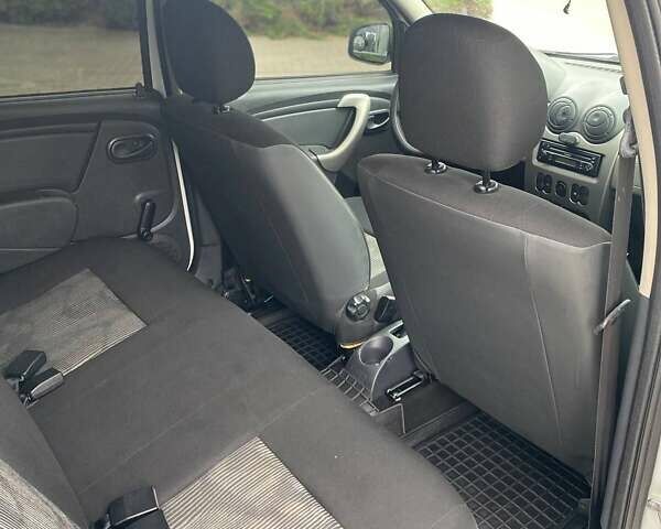 Білий Дачія Sandero, об'ємом двигуна 1.4 л та пробігом 255 тис. км за 4200 $, фото 17 на Automoto.ua