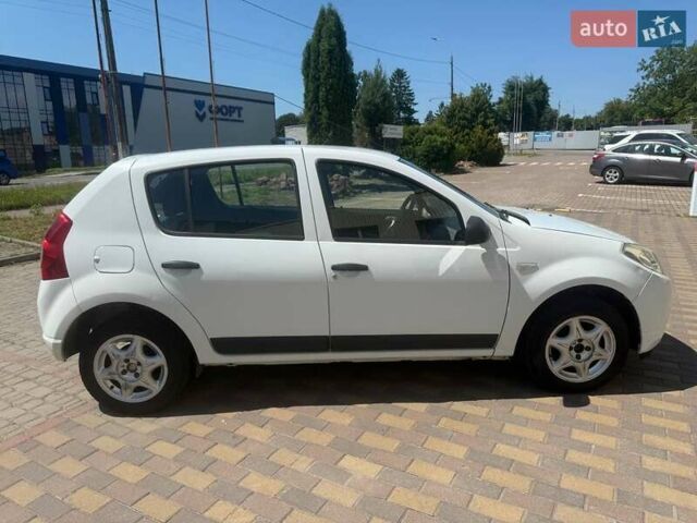 Білий Дачія Sandero, об'ємом двигуна 1.15 л та пробігом 219 тис. км за 4100 $, фото 6 на Automoto.ua