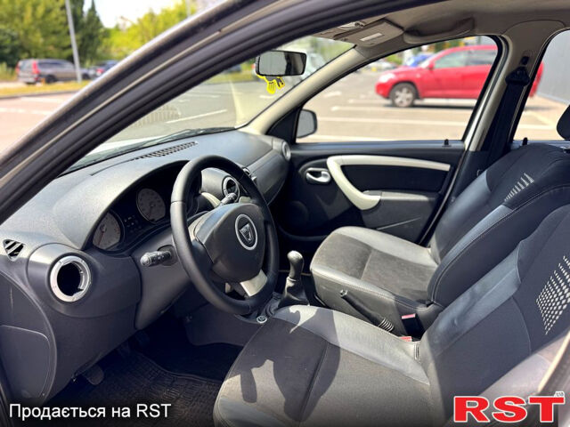 Білий Дачія Sandero, об'ємом двигуна 1.2 л та пробігом 235 тис. км за 3500 $, фото 8 на Automoto.ua