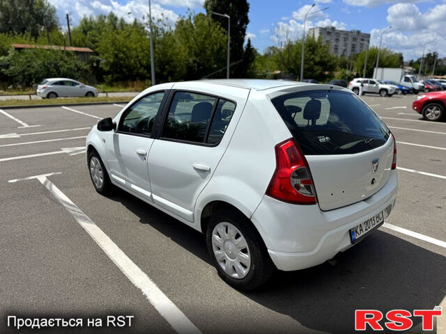 Білий Дачія Sandero, об'ємом двигуна 1.2 л та пробігом 235 тис. км за 3500 $, фото 6 на Automoto.ua