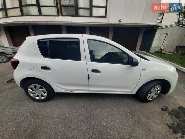 Білий Дачія Sandero, об'ємом двигуна 1 л та пробігом 130 тис. км за 5500 $, фото 3 на Automoto.ua