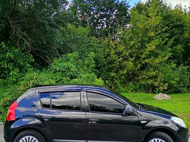 Черный Дачия Сандеро, объемом двигателя 1.1 л и пробегом 192 тыс. км за 4700 $, фото 2 на Automoto.ua