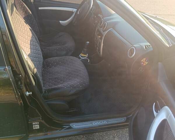 Черный Дачия Сандеро, объемом двигателя 1.6 л и пробегом 180 тыс. км за 5300 $, фото 9 на Automoto.ua