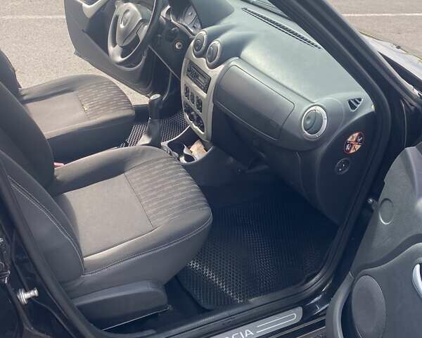 Дачия Сандеро 2012 в Первомайск на Automoto.ua Черный Дачия Сандеро, объемом двигателя 1.5 л и пробегом 222 тыс. км за 4800 $, фото 12 на Automoto.ua