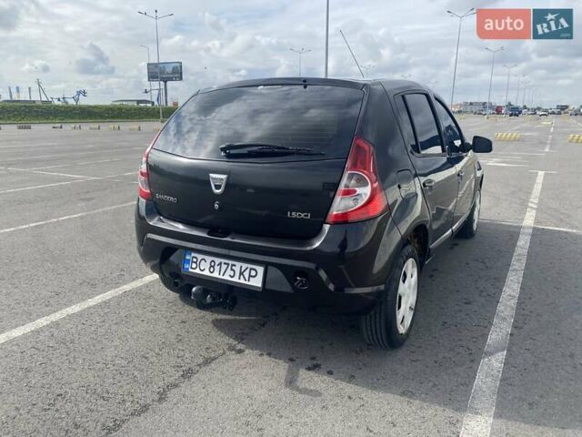 Дачия Сандеро 2012 в Первомайск на Automoto.ua Черный Дачия Сандеро, объемом двигателя 1.5 л и пробегом 222 тыс. км за 4800 $, фото 4 на Automoto.ua
