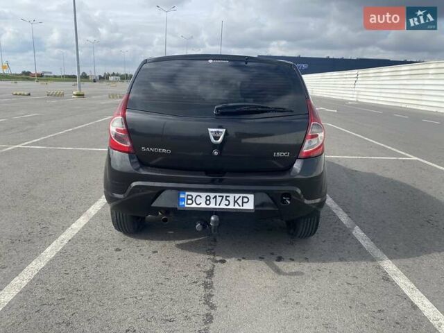 Дачия Сандеро 2012 в Первомайск на Automoto.ua Черный Дачия Сандеро, объемом двигателя 1.5 л и пробегом 222 тыс. км за 4800 $, фото 5 на Automoto.ua