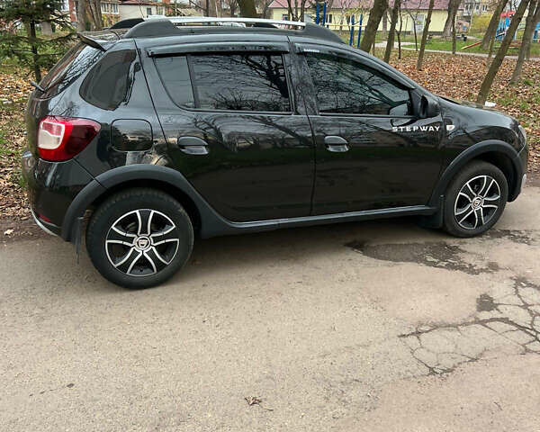 Черный Дачия Сандеро, объемом двигателя 1.5 л и пробегом 215 тыс. км за 7650 $, фото 1 на Automoto.ua