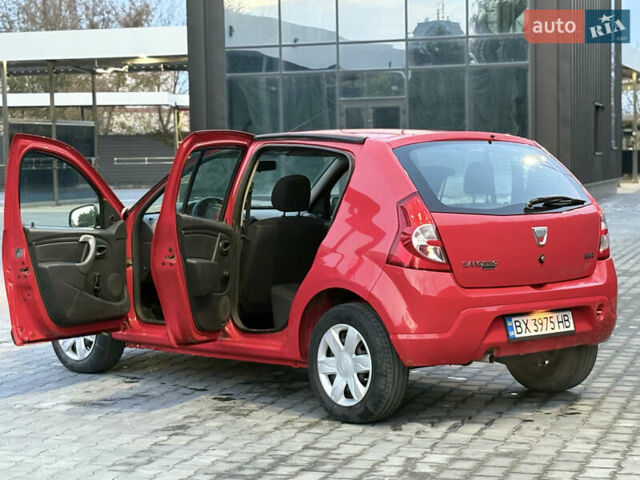 Дачія Sandero 2008 у Каменце-Подольском на Automoto.ua Червоний Дачія Sandero, об'ємом двигуна 1.39 л та пробігом 175 тис. км за 3850 $, фото 6 на Automoto.ua
