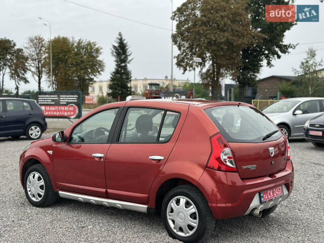Червоний Дачія Sandero, об'ємом двигуна 1.4 л та пробігом 166 тис. км за 5600 $, фото 14 на Automoto.ua