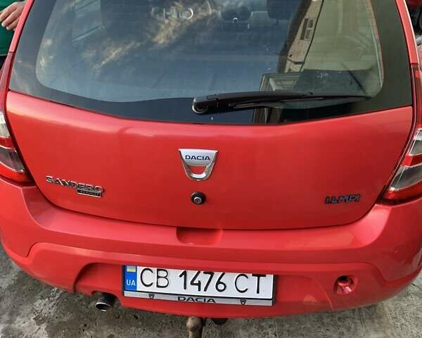 Красный Дачия Сандеро, объемом двигателя 1.4 л и пробегом 220 тыс. км за 4900 $, фото 1 на Automoto.ua