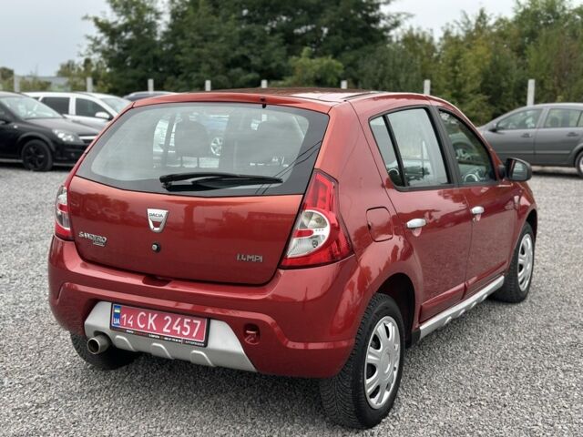 Червоний Дачія Sandero, об'ємом двигуна 1.4 л та пробігом 166 тис. км за 5600 $, фото 4 на Automoto.ua