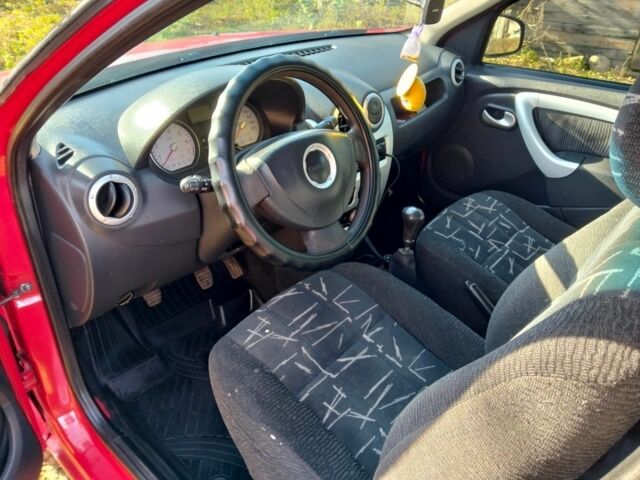 Красный Дачия Сандеро, объемом двигателя 1.4 л и пробегом 243 тыс. км за 3500 $, фото 4 на Automoto.ua