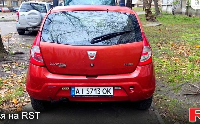 Красный Дачия Сандеро, объемом двигателя 1.4 л и пробегом 348 тыс. км за 3000 $, фото 1 на Automoto.ua