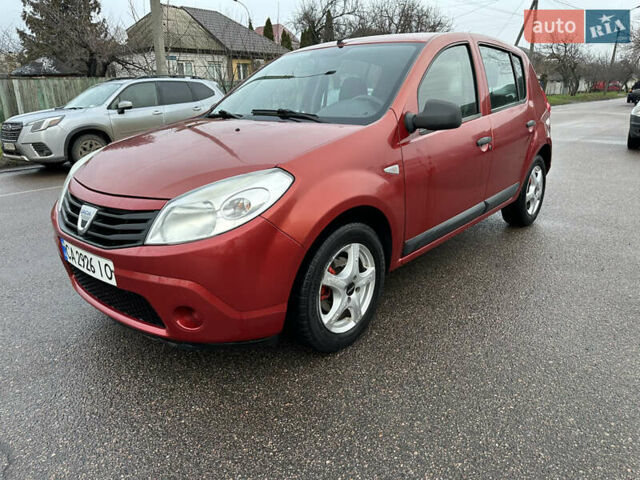 Красный Дачия Сандеро, объемом двигателя 1.4 л и пробегом 234 тыс. км за 4199 $, фото 1 на Automoto.ua