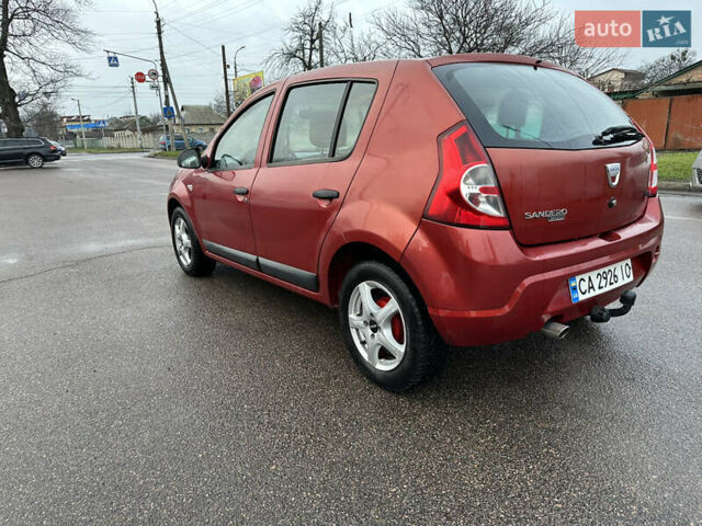 Красный Дачия Сандеро, объемом двигателя 1.4 л и пробегом 234 тыс. км за 4199 $, фото 2 на Automoto.ua