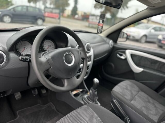 Червоний Дачія Sandero, об'ємом двигуна 1.4 л та пробігом 166 тис. км за 5600 $, фото 5 на Automoto.ua
