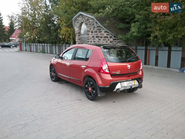Червоний Дачія Sandero, об'ємом двигуна 1.4 л та пробігом 140 тис. км за 6150 $, фото 2 на Automoto.ua