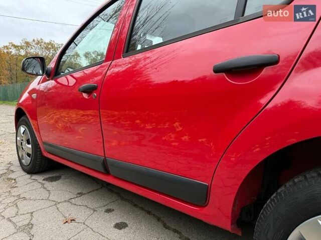 Красный Дачия Сандеро, объемом двигателя 1.39 л и пробегом 164 тыс. км за 4000 $, фото 14 на Automoto.ua