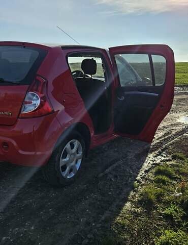 Красный Дачия Сандеро, объемом двигателя 1.4 л и пробегом 206 тыс. км за 4300 $, фото 9 на Automoto.ua