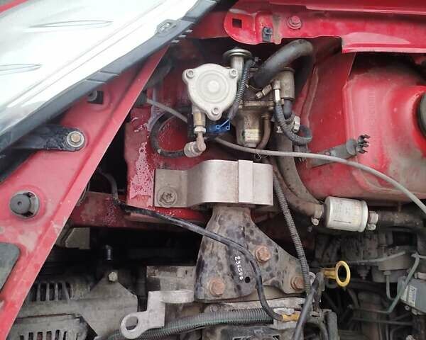 Красный Дачия Сандеро, объемом двигателя 1.4 л и пробегом 290 тыс. км за 3650 $, фото 10 на Automoto.ua