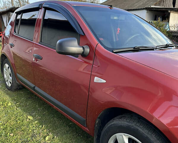 Червоний Дачія Sandero, об'ємом двигуна 1.4 л та пробігом 180 тис. км за 4800 $, фото 2 на Automoto.ua